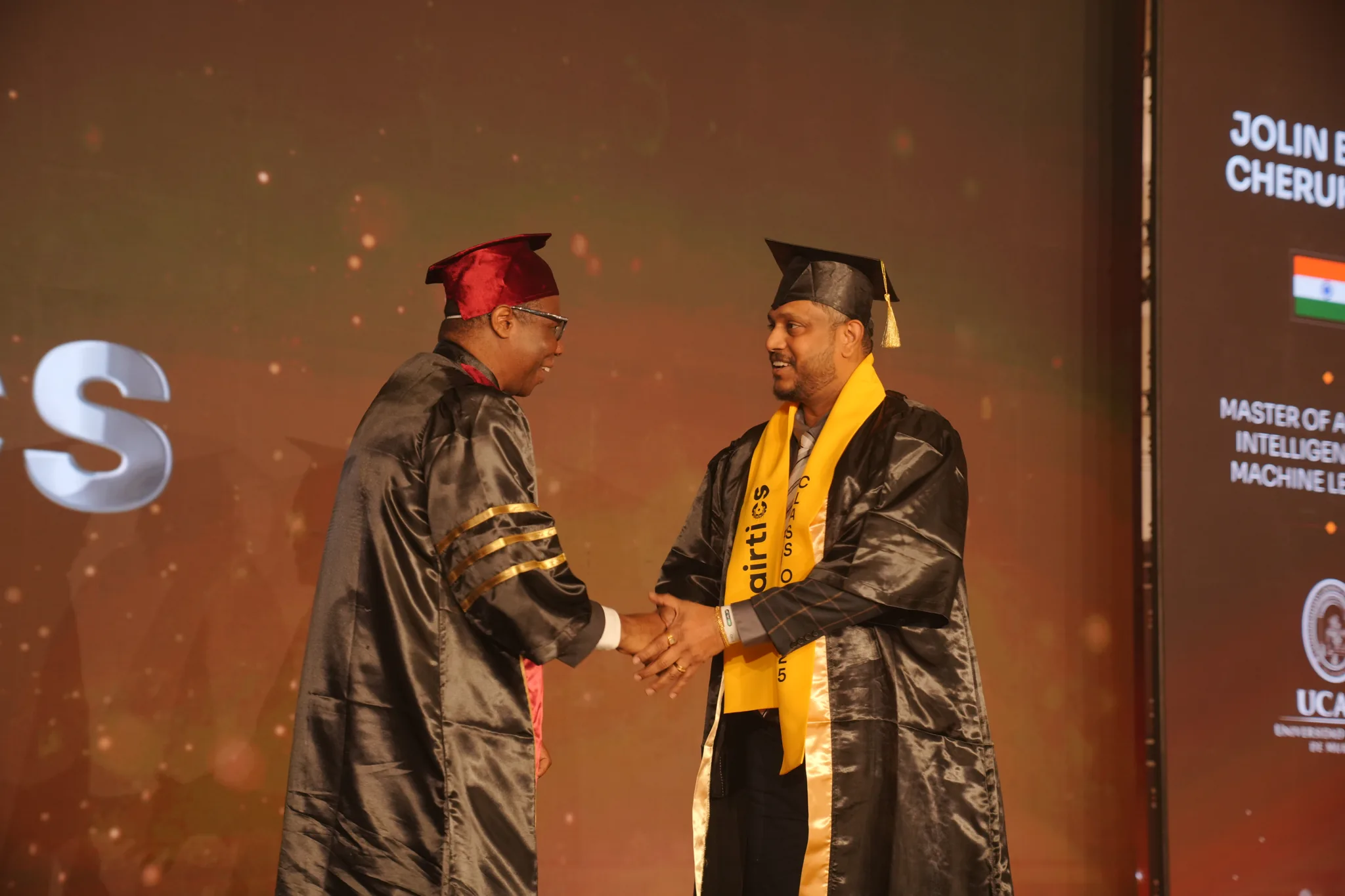 Airtics Graduation 2026: graduate being hooded on stage during the Airtics convocation ceremony