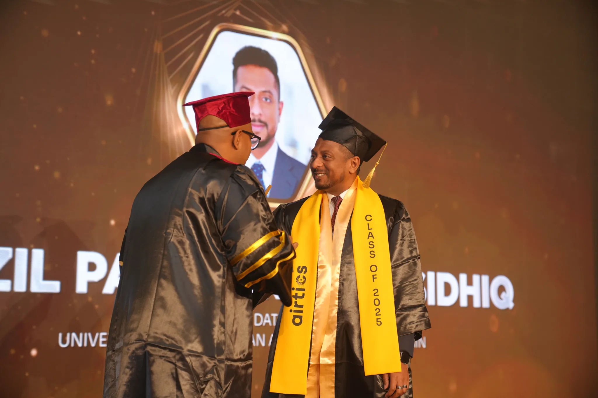 Airtics Graduation 2026: graduate congratulated on stage by the Airtics academic panel
